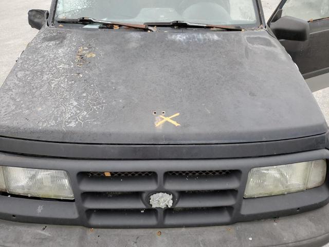 Photo 11 from auction – 1998 CHEVROLET TRACKER with VIN 2CNBJ1861W6908098