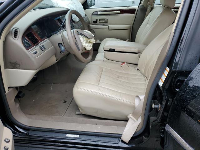 Photo 7 from auction – 2004 LINCOLN TOWN CAR E with VIN 1LNHM81W24Y680222