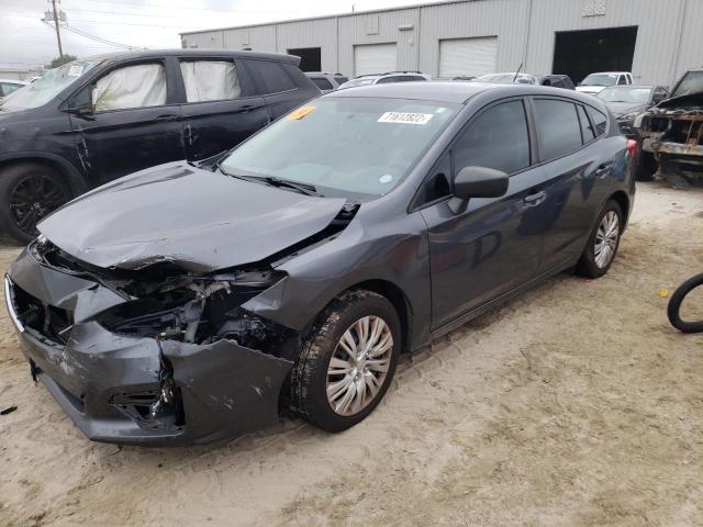 SUBARU IMPREZA 2018 with VIN 4S3GTAA60J3731395 - Photo from auction