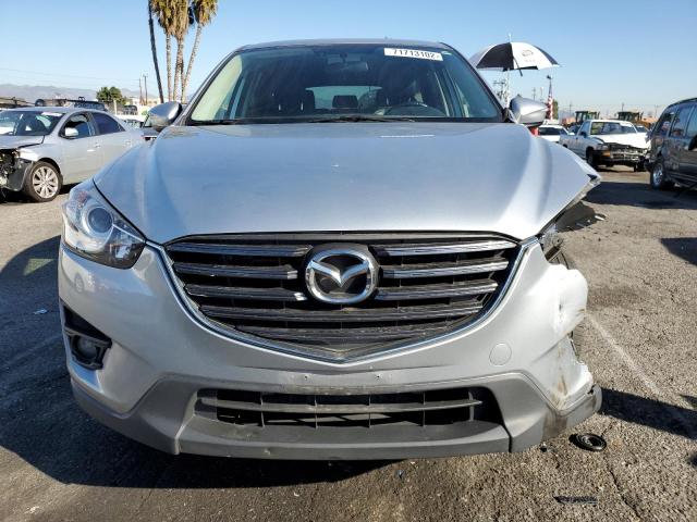 Photo 5 from auction – 2016 MAZDA CX-5 GT with VIN JM3KE2DY3G0876598