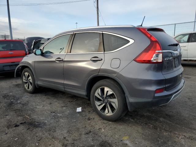 Photo 2 from auction – 2015 HONDA CR-V TOURI with VIN 5J6RM3H97FL021364