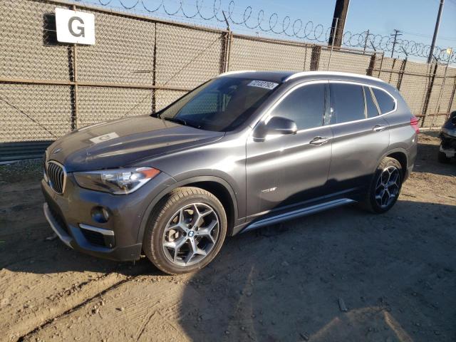 BMW X1 XDRIVE2 2018 with VIN WBXHT3C36J5L26409 - Photo from auction