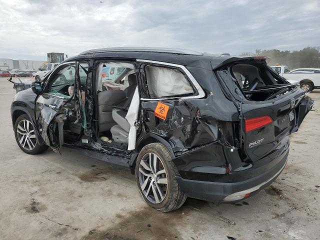 Photo 2 from auction – 2017 HONDA PILOT TOUR with VIN 5FNYF5H91HB027660