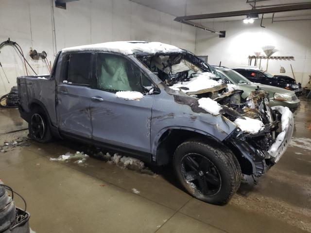 Photo 4 from auction – 2022 HONDA RIDGELINE with VIN 5FPYK3F84NB032008