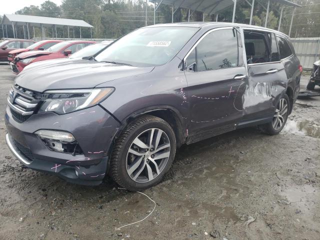 HONDA PILOT ELIT 2017 with VIN 5FNYF6H03HB103953 - Photo from auction