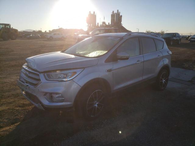 FORD ESCAPE TIT 2017 with VIN 1FMCU0J91HUA94694 - Photo from auction