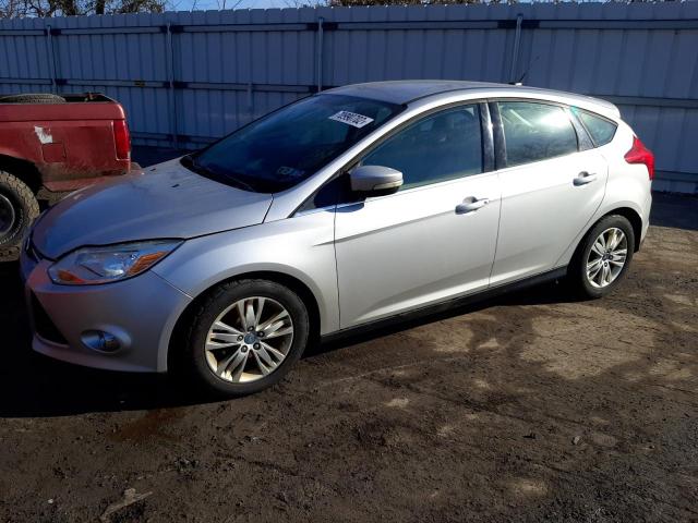 FORD FOCUS 2012 with VIN 1FAHP3M27CL408872 - Photo from auction