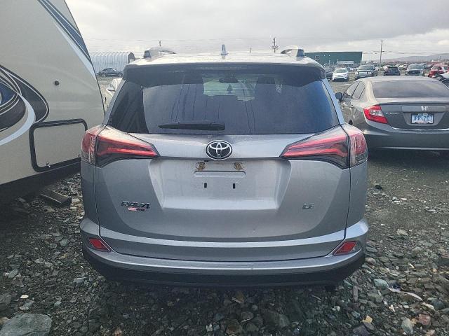 Photo 6 from auction – 2018 TOYOTA RAV4 LE with VIN 2T3ZFREV9JW493043