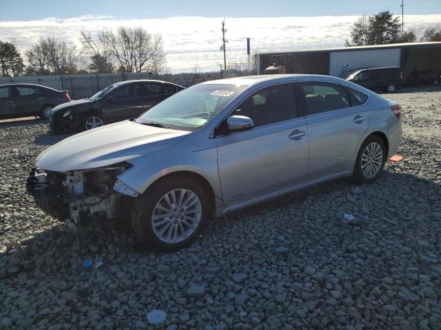 TOYOTA AVALON HYB 2014 with VIN 4T1BD1EB4EU023015 - Photo from auction