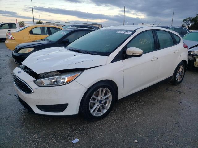 FORD FOCUS SE 2017 with VIN 1FADP3K25HL327412 - Photo from auction