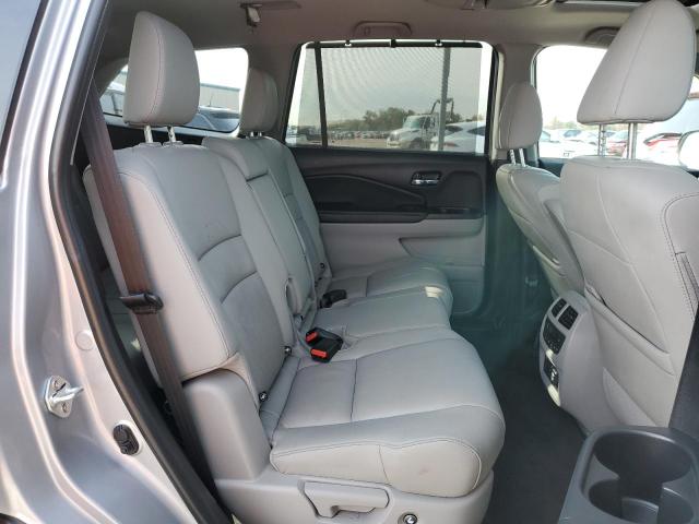 Photo 11 from auction – 2022 HONDA PILOT TOUR with VIN 5FNYF5H98NB016473