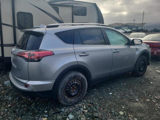 Photo 3 from auction – 2018 TOYOTA RAV4 LE with VIN 2T3ZFREV9JW493043