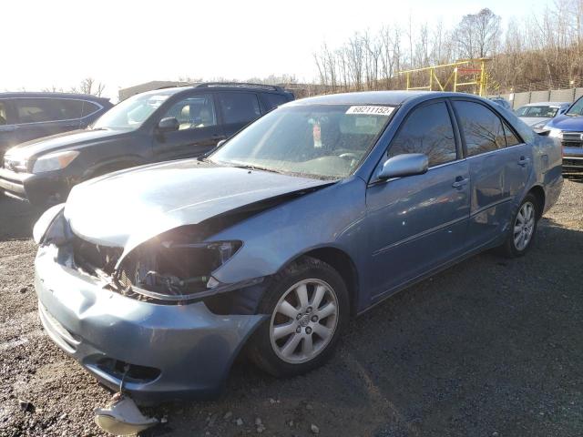TOYOTA CAMRY LE 2003 with VIN 4T1BE30K83U764751 - Photo from auction