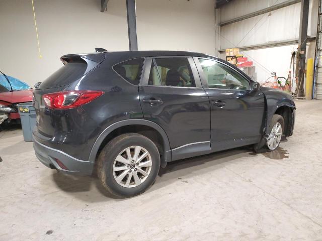 Photo 3 from auction – 2013 MAZDA CX-5 TOURI with VIN JM3KE4CE2D0142792