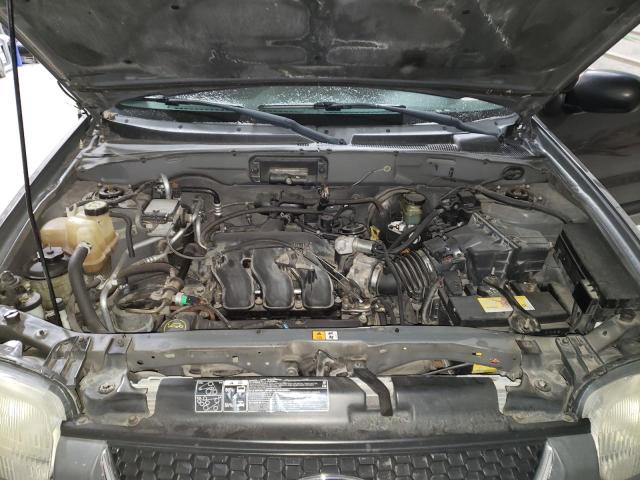 Photo 11 from auction – 2003 FORD ESCAPE XLT with VIN 1FMYU03103KE15836