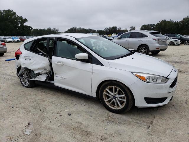 Photo 4 from auction – 2018 FORD FOCUS SE with VIN 1FADP3K22JL225443