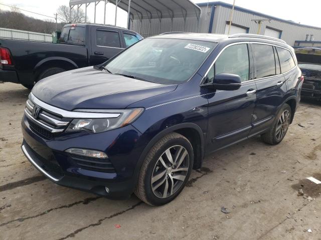 HONDA PILOT TOUR 2018 with VIN 5FNYF5H94JB023754 - Photo from auction
