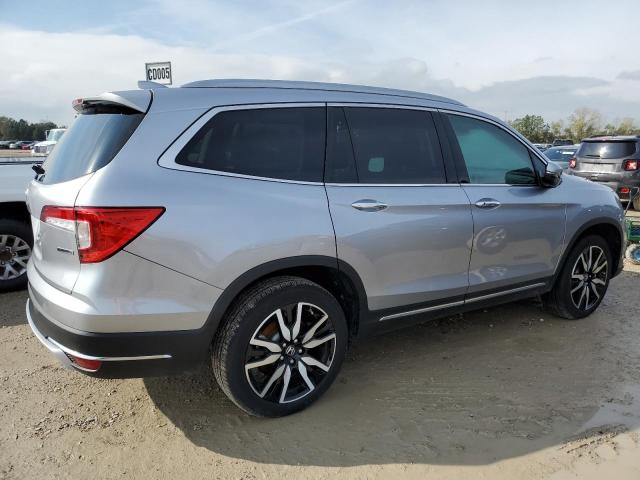 Photo 3 from auction – 2022 HONDA PILOT TOUR with VIN 5FNYF5H98NB016473