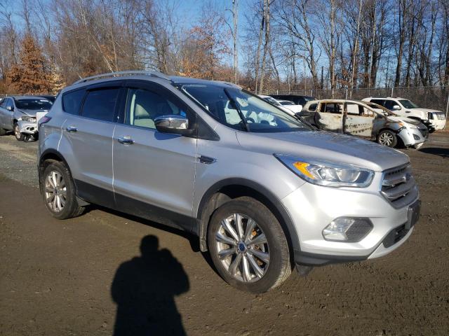 Photo 4 from auction – 2017 FORD ESCAPE TIT with VIN 1FMCU9J96HUA63073