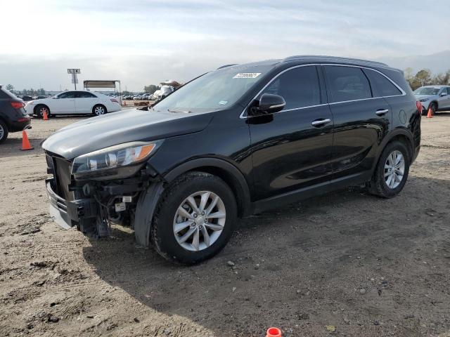 KIA SORENTO LX 2016 with VIN 5XYPG4A31GG033216 - Photo from auction