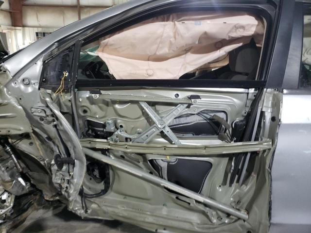 Photo 7 from auction – 2014 HONDA CR-V LX with VIN 2HKRM4H31EH673049