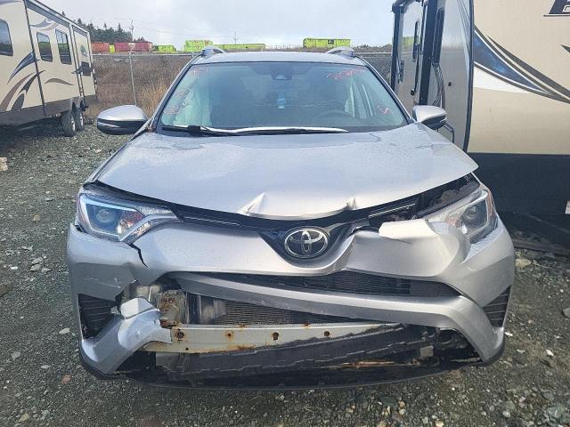 Photo 5 from auction – 2018 TOYOTA RAV4 LE with VIN 2T3ZFREV9JW493043