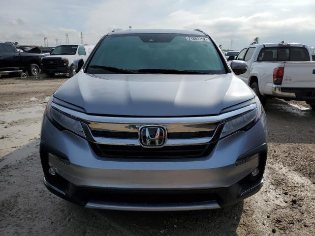 Photo 5 from auction – 2022 HONDA PILOT TOUR with VIN 5FNYF5H98NB016473