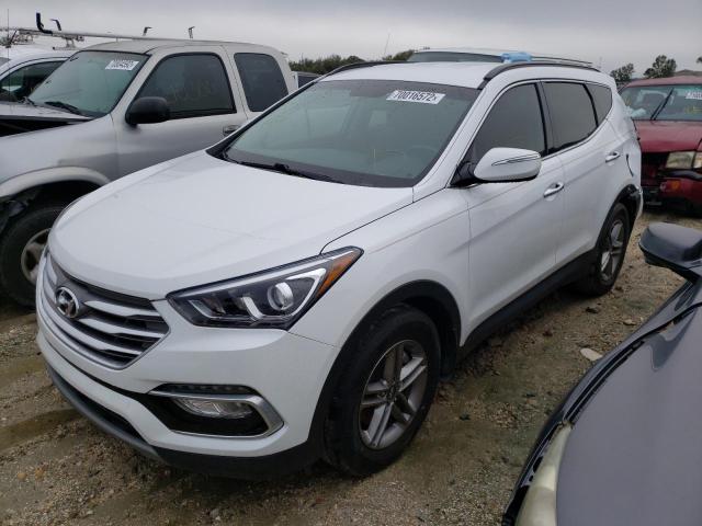 HYUNDAI SANTA FE S 2018 with VIN 5NMZU3LB1JH099486 - Photo from auction