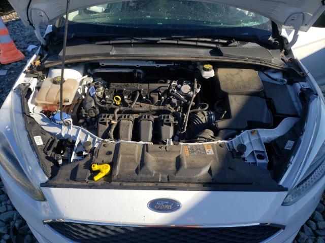 Foto 11 de la subasta – 2018 FORD FOCUS S con VIN 1FADP3E20JL299228