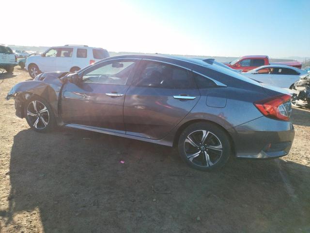 Photo 2 from auction – 2016 HONDA CIVIC TOUR with VIN 19XFC1F96GE200511