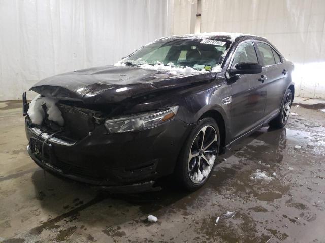 FORD TAURUS SEL 2014 with VIN 1FAHP2E81EG102128 - Photo from auction