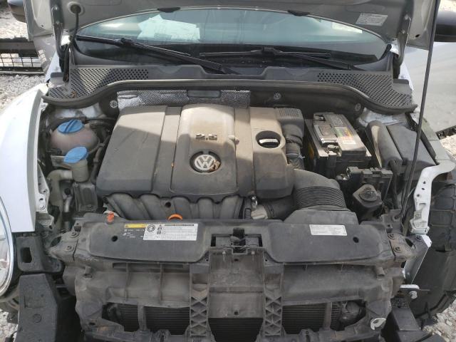 Photo 11 from auction – 2013 VOLKSWAGEN BEETLE with VIN 3VWFP7AT1DM668428