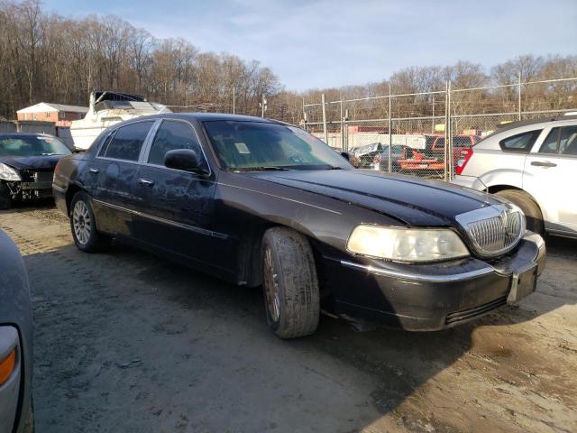 Photo 4 from auction – 2004 LINCOLN TOWN CAR E with VIN 1LNHM81W64Y618967
