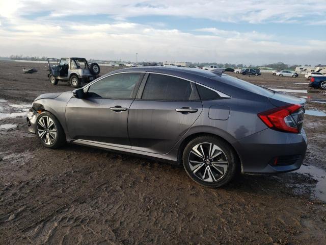 Photo 2 from auction – 2018 HONDA CIVIC EX with VIN JHMFC1F35JX015397