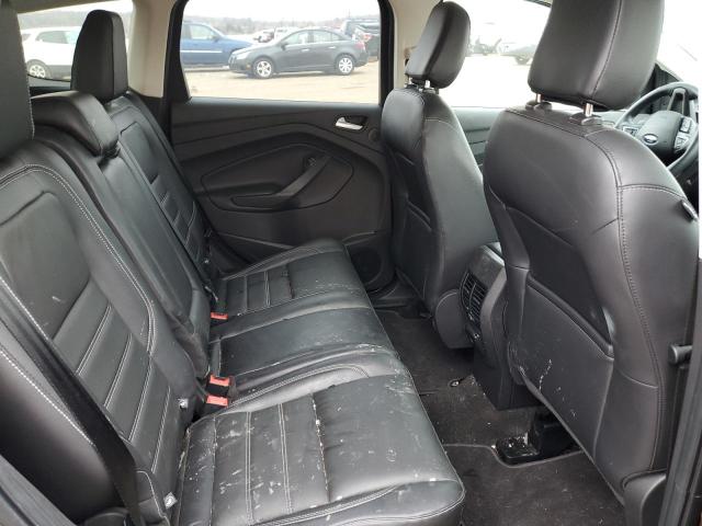 Photo 11 from auction – 2018 FORD ESCAPE TIT with VIN 1FMCU9J99JUB25037
