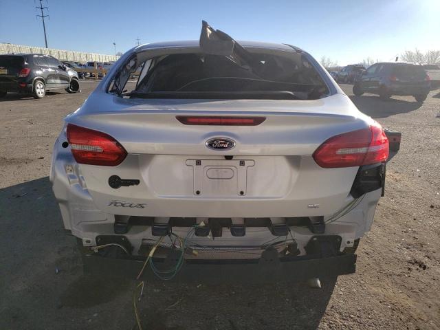 Фото 6 с аукциона – 2018 FORD FOCUS SE с VIN 1FADP3F25JL210865