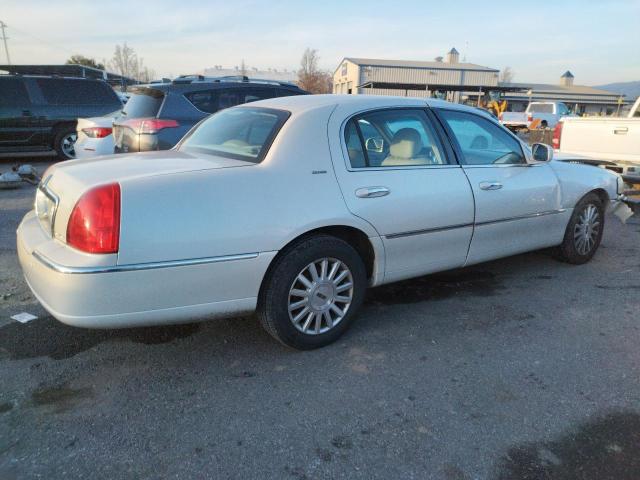 Photo 3 from auction – 2004 LINCOLN TOWN CAR U with VIN 1LNHM83W44Y665668