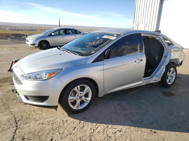 FORD FOCUS SE 2018 with VIN 1FADP3F25JL210865 - Photo from auction