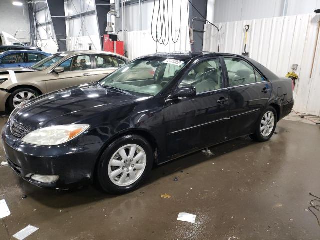 TOYOTA CAMRY LE 2003 with VIN 4T1BE30K03U131712 - Photo from auction