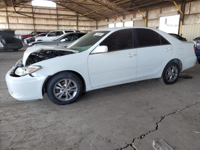 TOYOTA CAMRY LE 2004 with VIN 4T1BF32KX4U072423 - Photo from auction