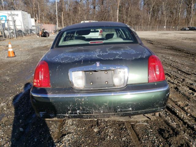 Photo 6 from auction – 1998 LINCOLN TOWN CAR E with VIN 1LNFM81W9WY629276