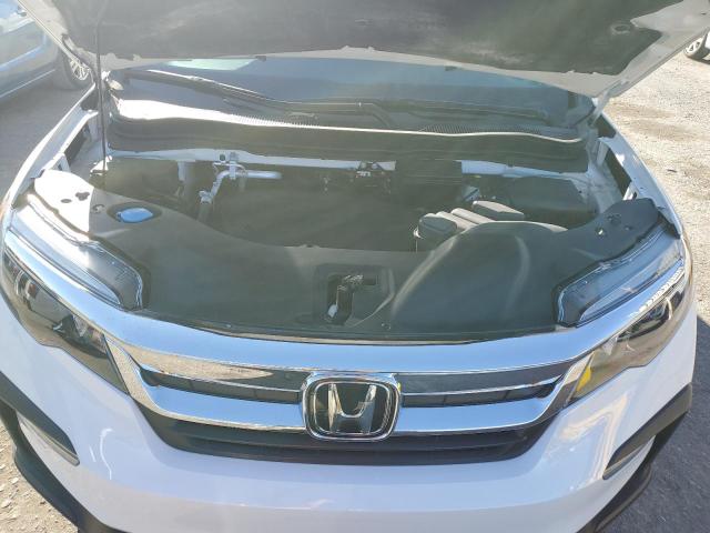 Photo 11 from auction – 2021 HONDA PILOT EXL with VIN 5FNYF6H5XMB011079
