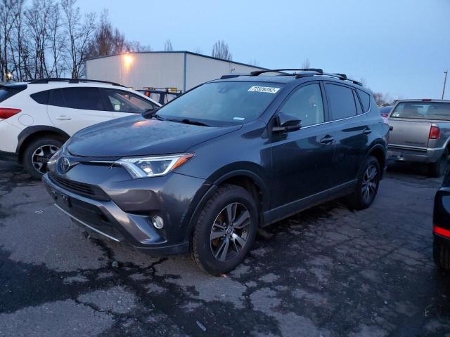 TOYOTA RAV4 XLE 2017 with VIN JTMWFREV8HJ143043 - Photo from auction