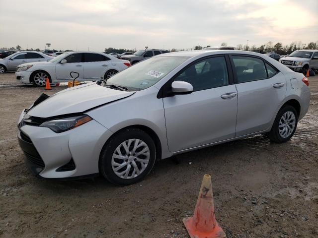 TOYOTA COROLLA L 2018 with VIN 5YFBURHE0JP804789 - Photo from auction