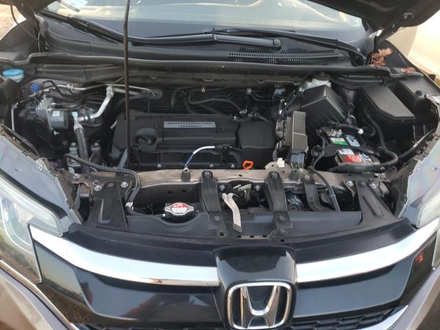Photo 11 from auction – 2015 HONDA CR-V LX with VIN 3CZRM3H30FG705455