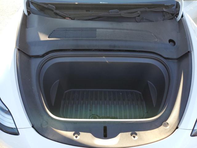 Photo 11 from auction – 2021 TESLA MODEL Y with VIN 5YJYGDEEXMF063575