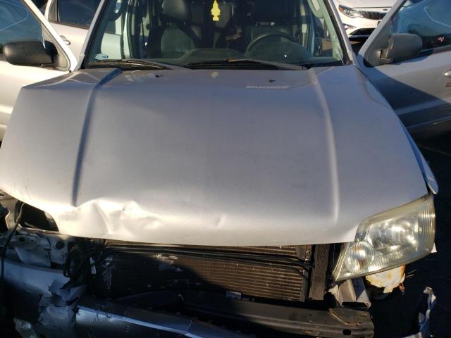 Photo 11 from auction – 2006 MERCURY MARINER with VIN 4M2YU57136KJ14004