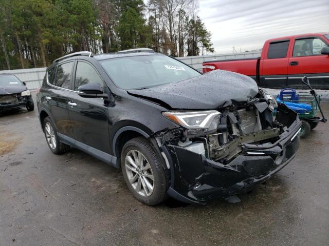 Photo 4 from auction – 2018 TOYOTA RAV4 LIMIT with VIN 2T3YFREV2JW429082