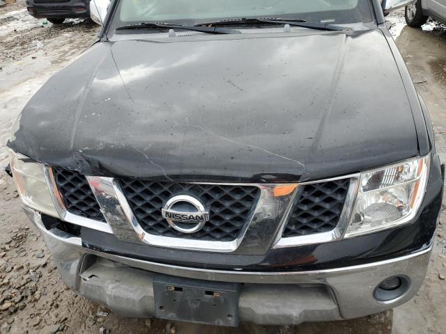 Photo 11 from auction – 2006 NISSAN FRONTIER K with VIN 1N6AD06W86C459933