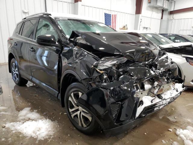 Photo 4 from auction – 2018 TOYOTA RAV4 LE with VIN 2T3ZFREV7JW471140
